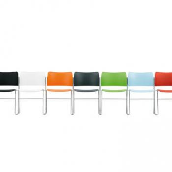 Row of various coloured 40/4 conference chairs
