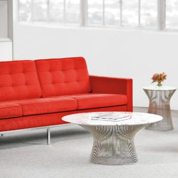 Red Florence Knoll sofa with a coffee table 