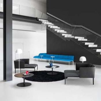 Black and white room with blue seating system
