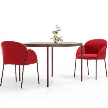 Two red Artifort Andrea chairs around table 