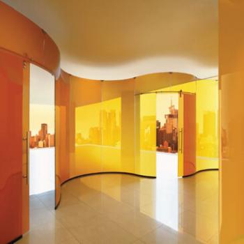 Freestanding orange glass wall, created by Casali.