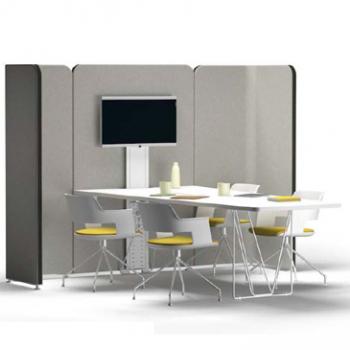 Lets meet presentation space with grey upholstery and white tables and chairs 