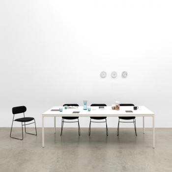 White Edge meeting table with 4 black chairs 