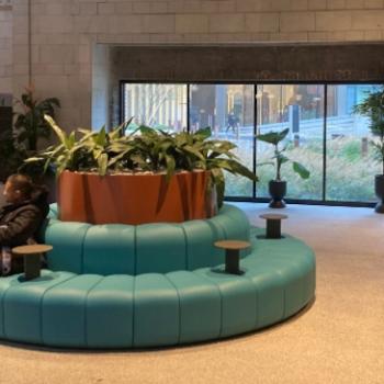 Bob seating at Battersea Power Station with planters