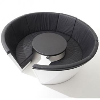 Kosmos seating system in white and black with a table from Extremis