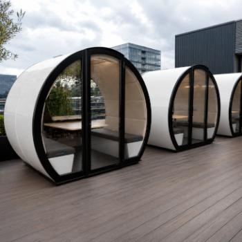 Outdoor 4 person pods creating meeting spaces on terrace